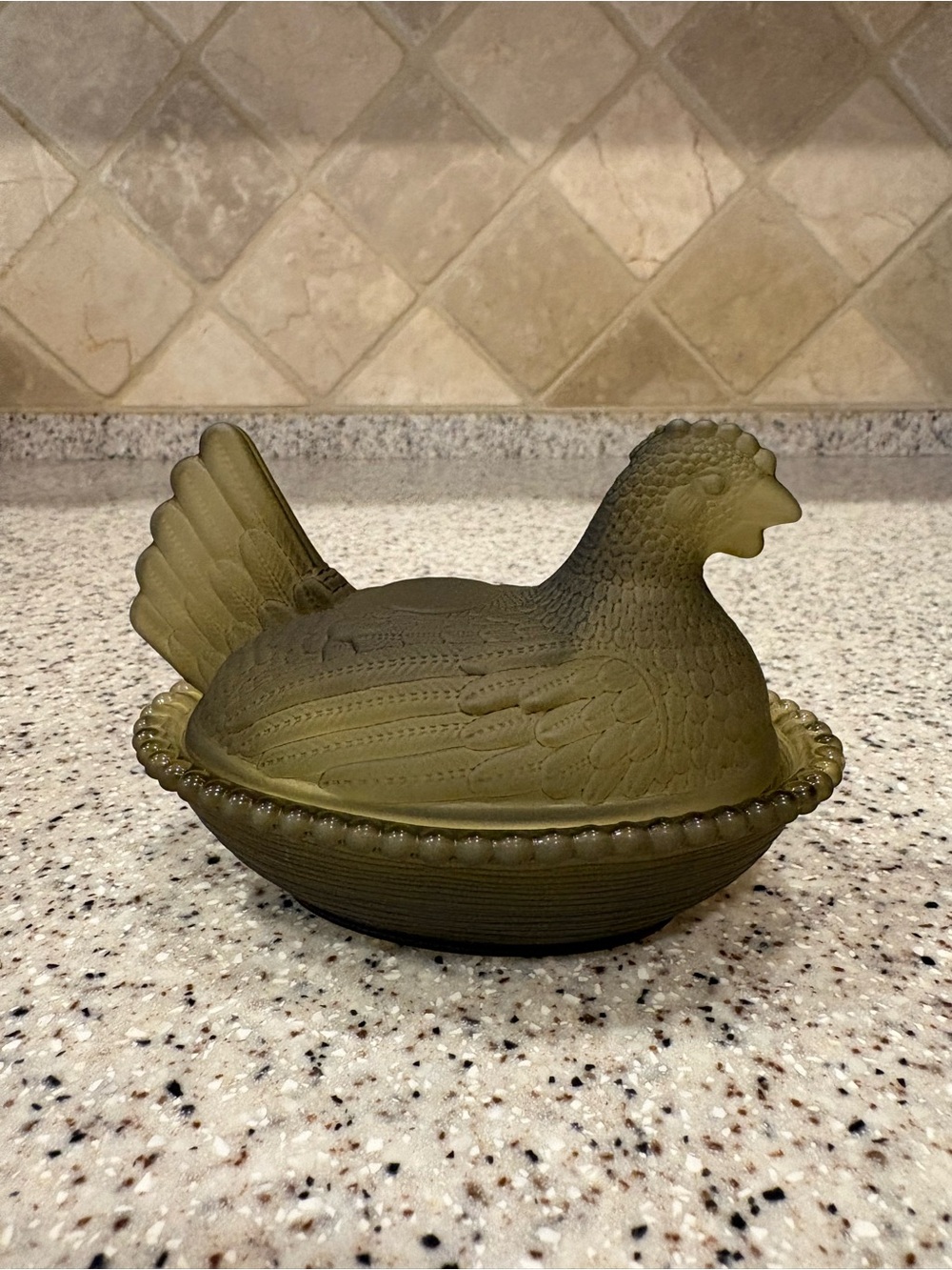 Olive green "hen on a nest"